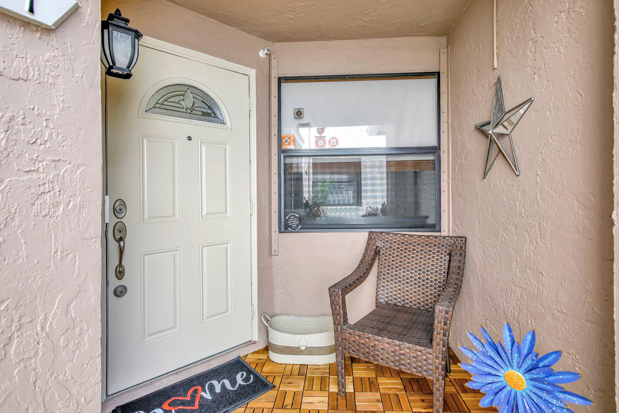 a view of a hallway with front door