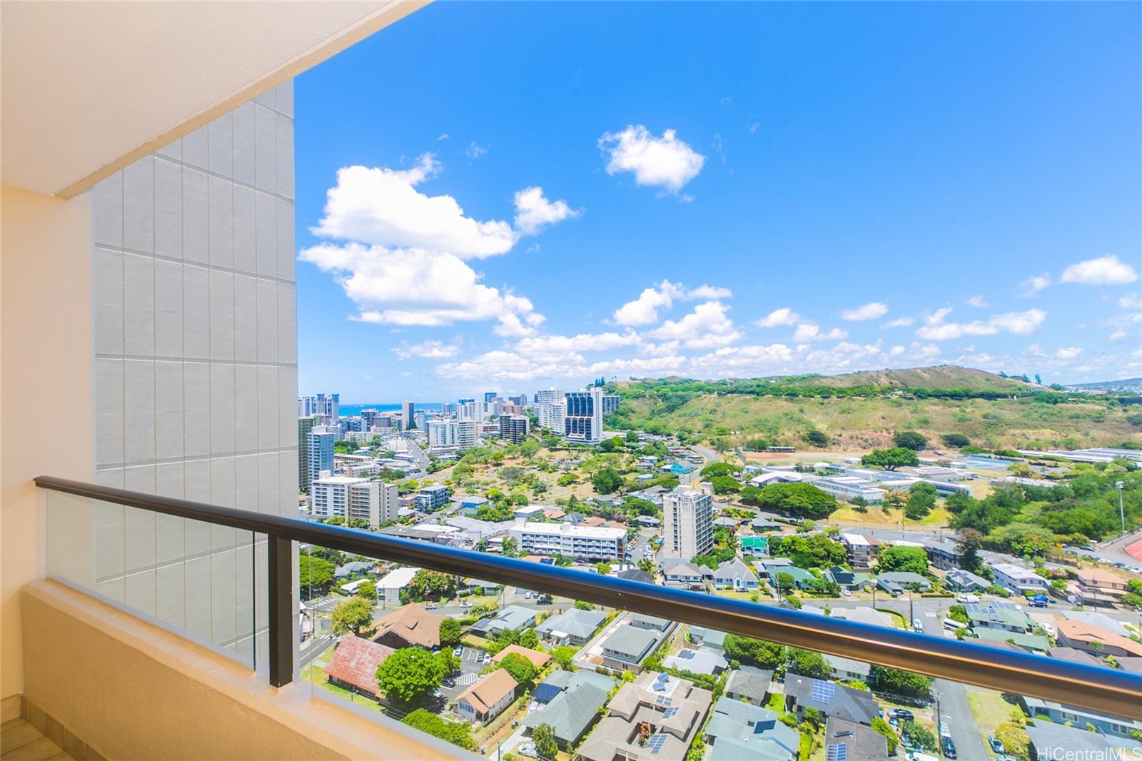 a view of a city from a balcony