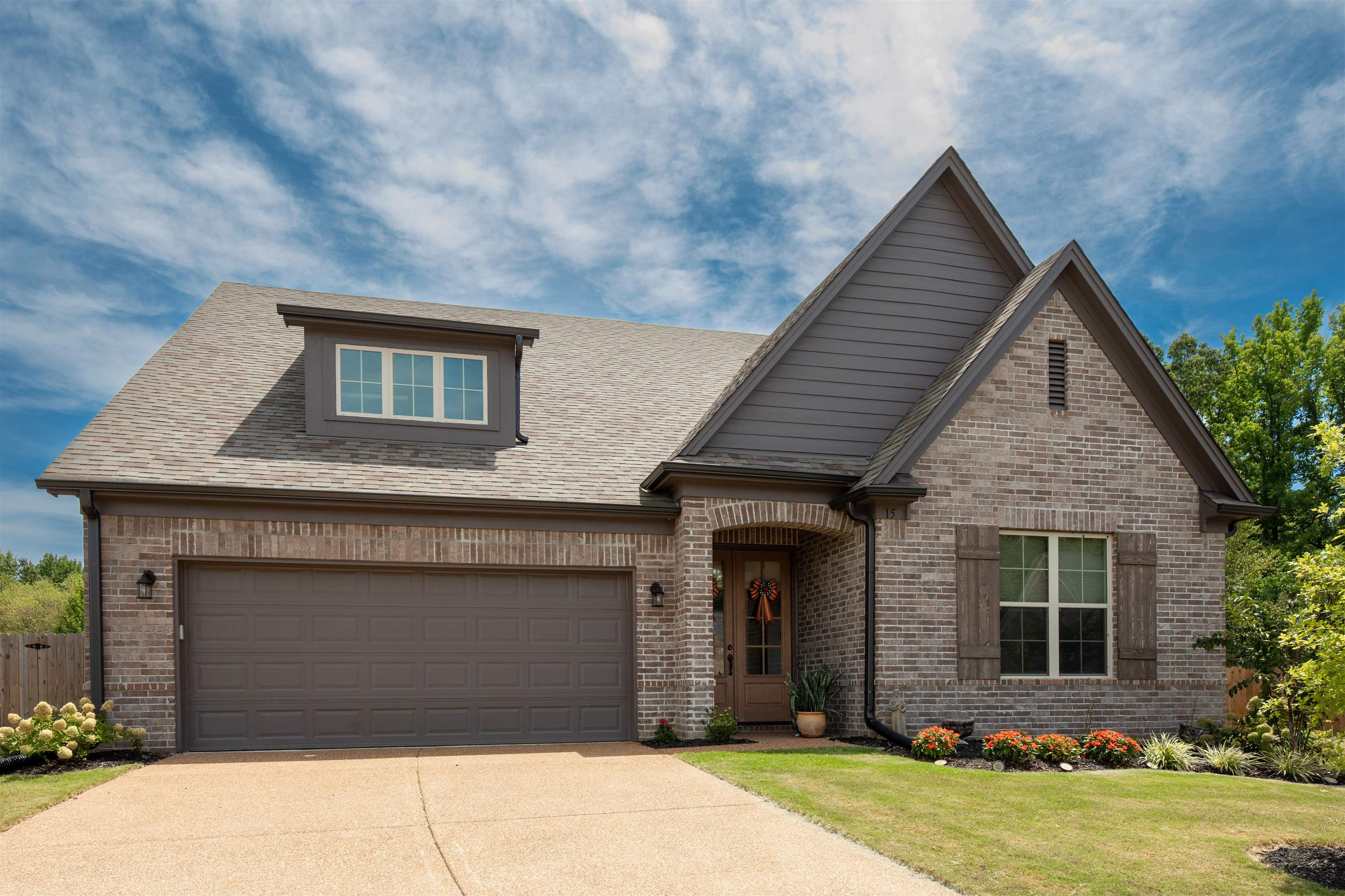 Craftsman-style home with a front yard