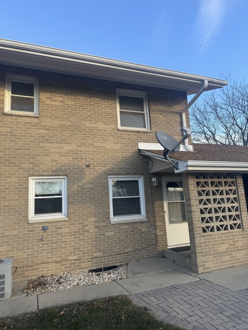 a front view of a house with a garage