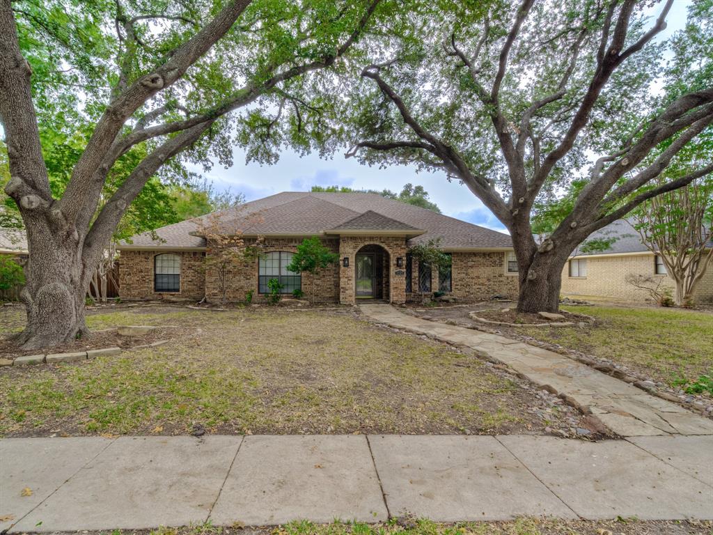 a house with trees in front of it