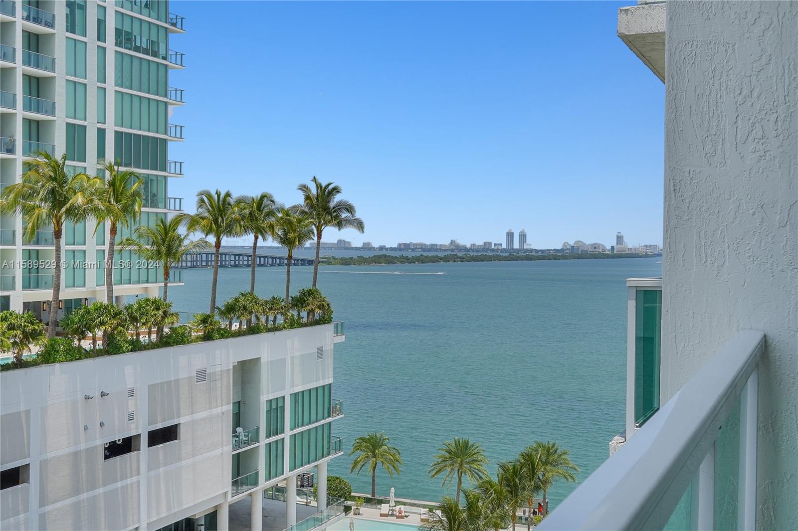 a view of a lake with a building in the background