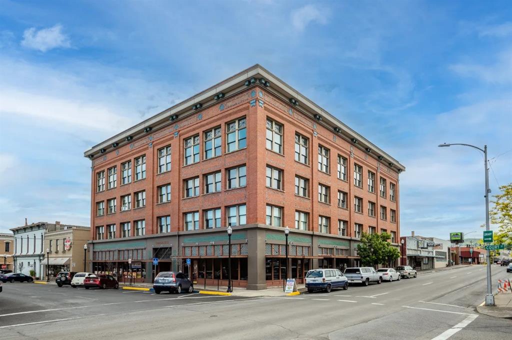 a view of a building with a street