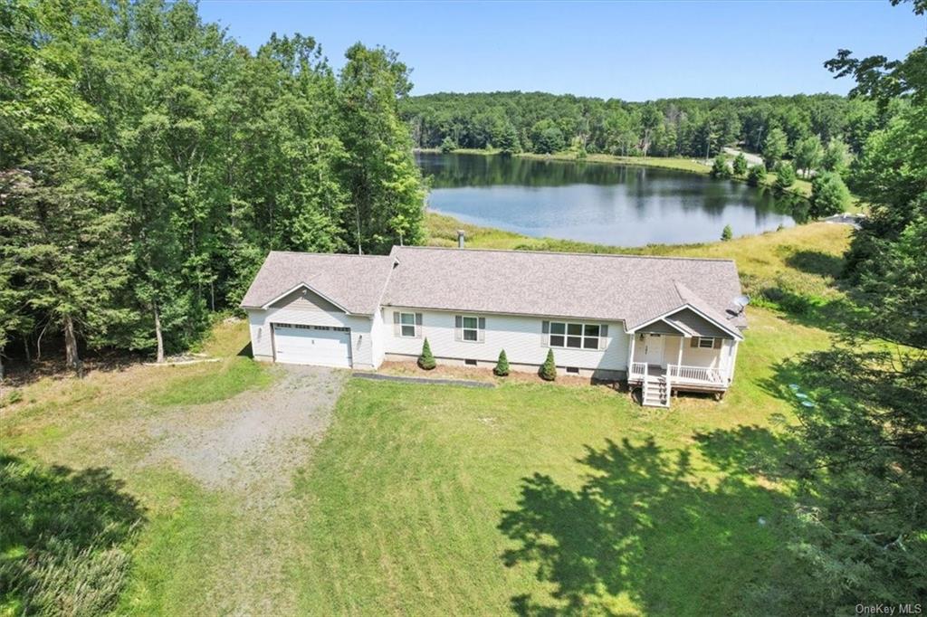 a aerial view of a house with garden