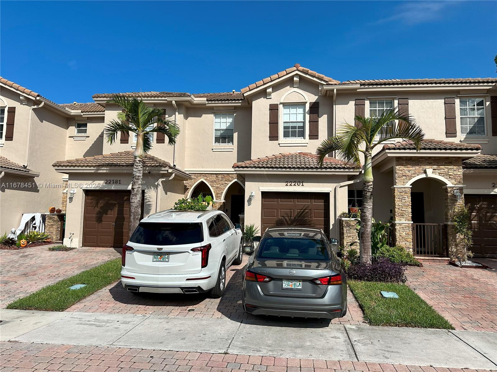 a car parked in front of a house