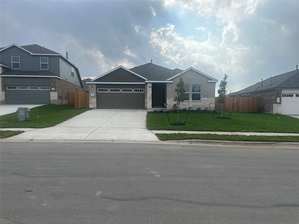 front view of house with a yard