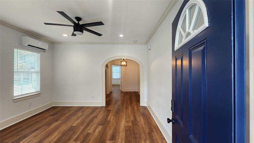 a view of entryway with wooden floor