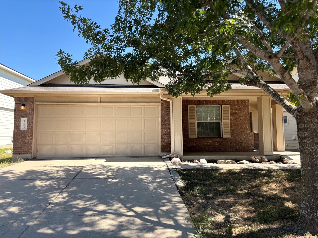 a front view of house with yard