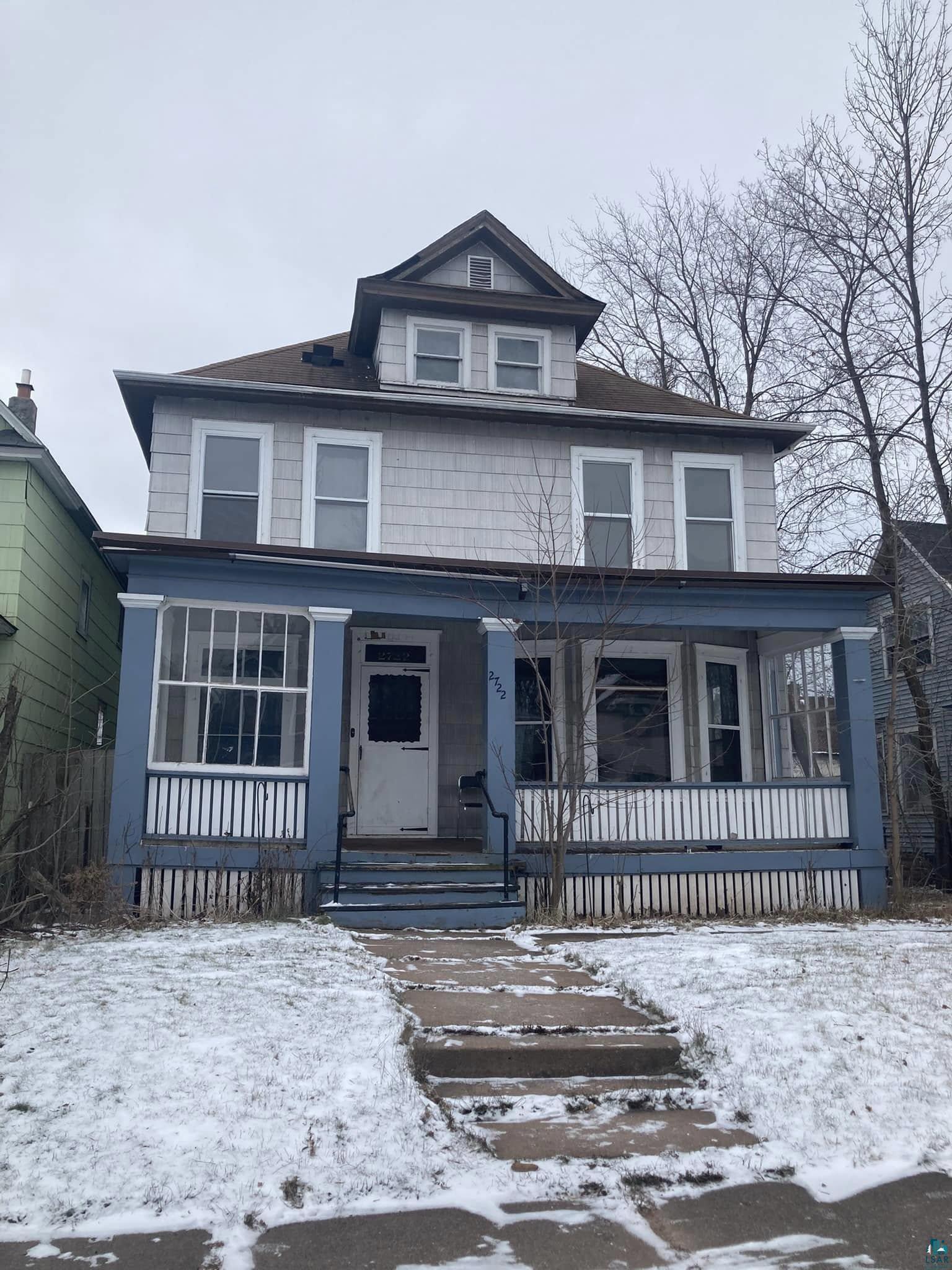 View of front facade featuring covered porch