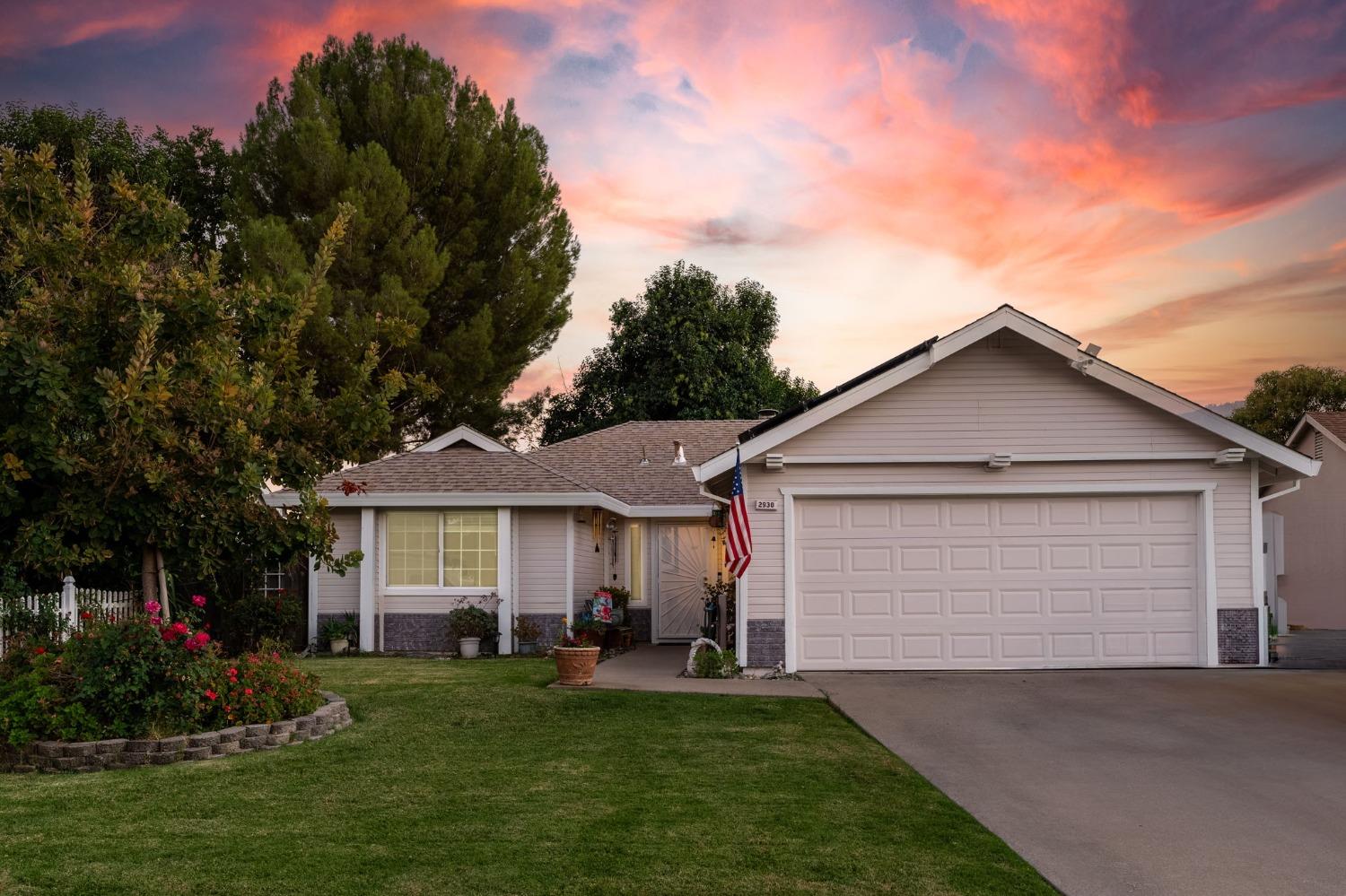 front view of a house and a yard