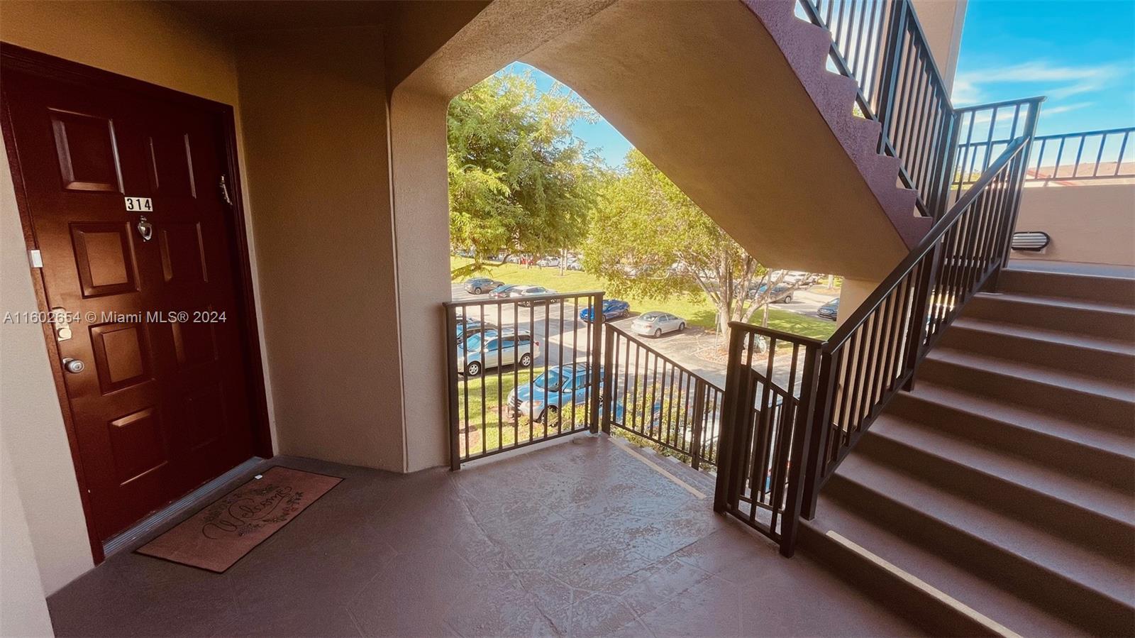 a view of an entryway with staircase