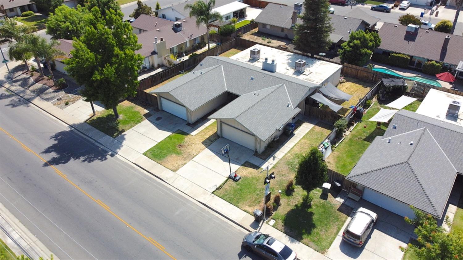 an aerial view of a house with a garden