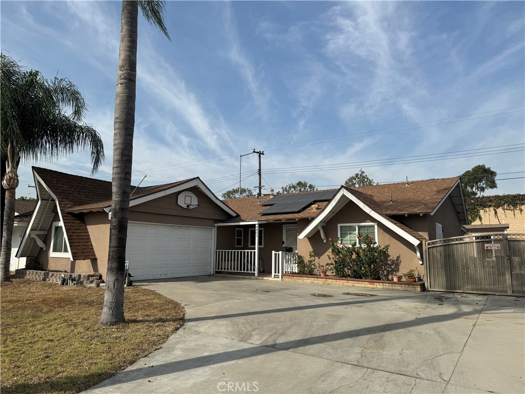 a front view of a house with garage