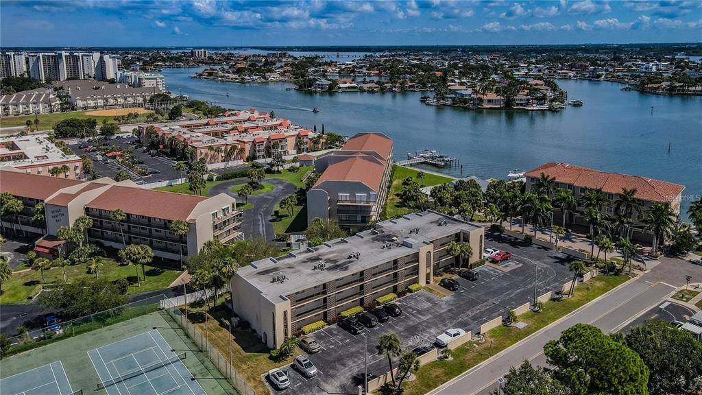 an aerial view of a house with a lake view