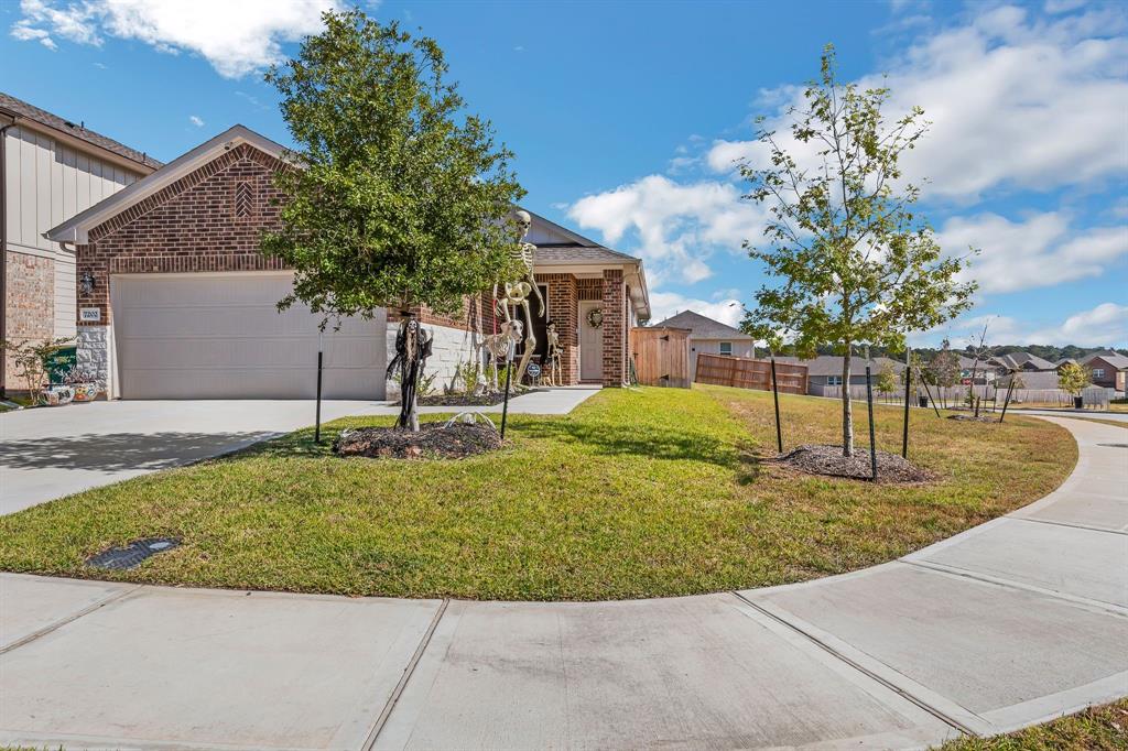 front view of a house with a yard