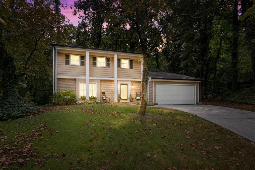 a house view with a garden space