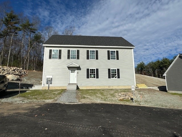 a front view of house with yard