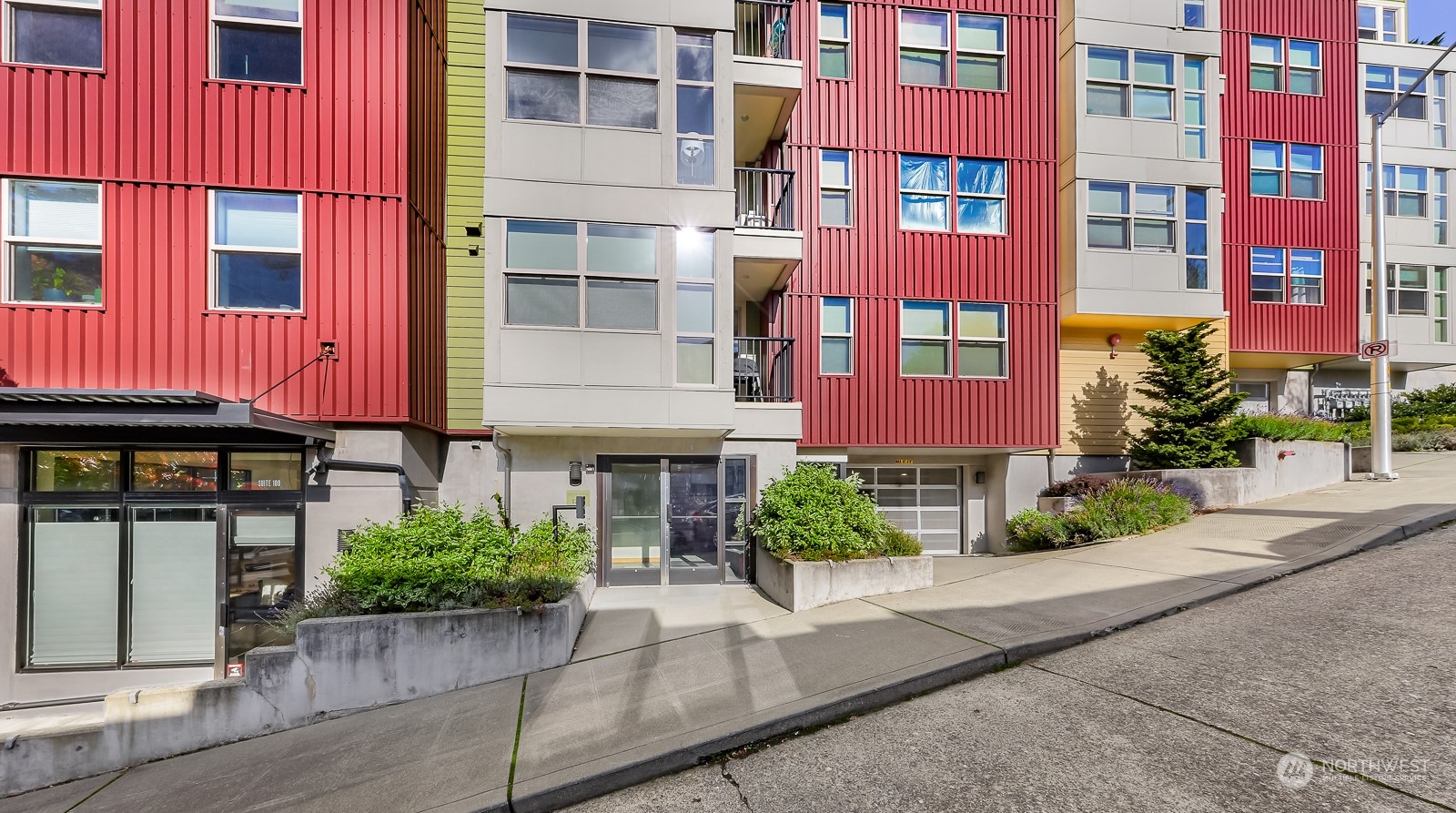 a front view of a multi story residential apartment building