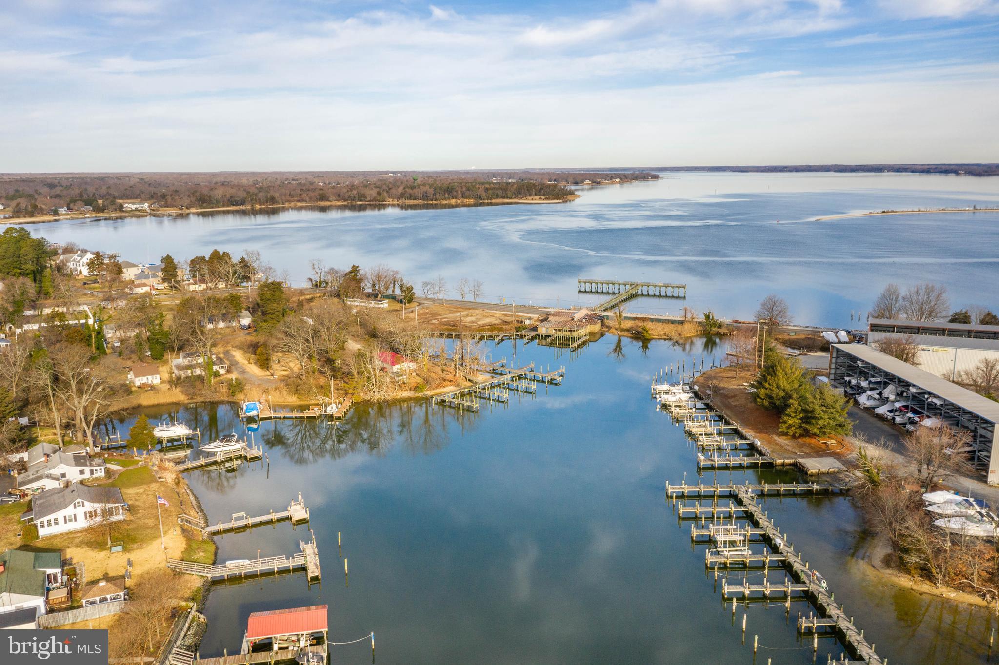 an aerial view of residential building and ocean