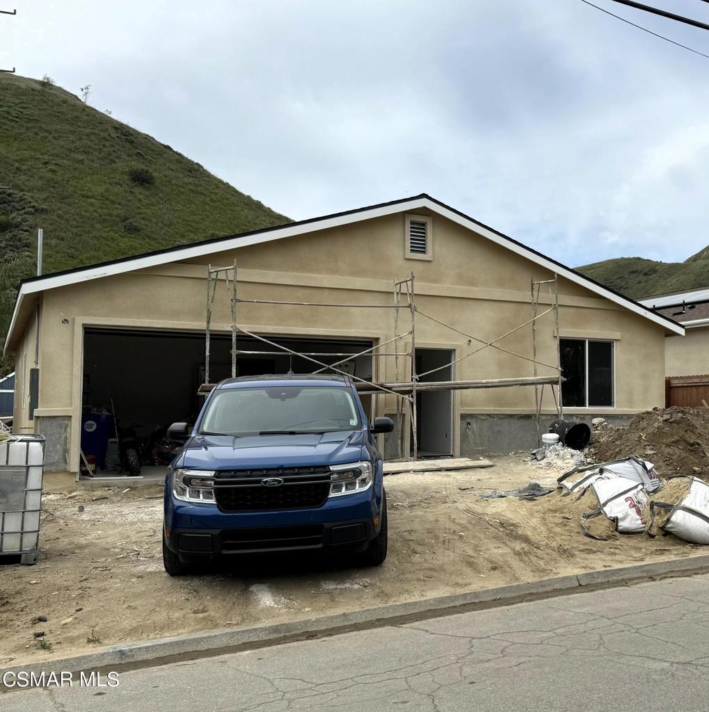 a car parked in front of a house