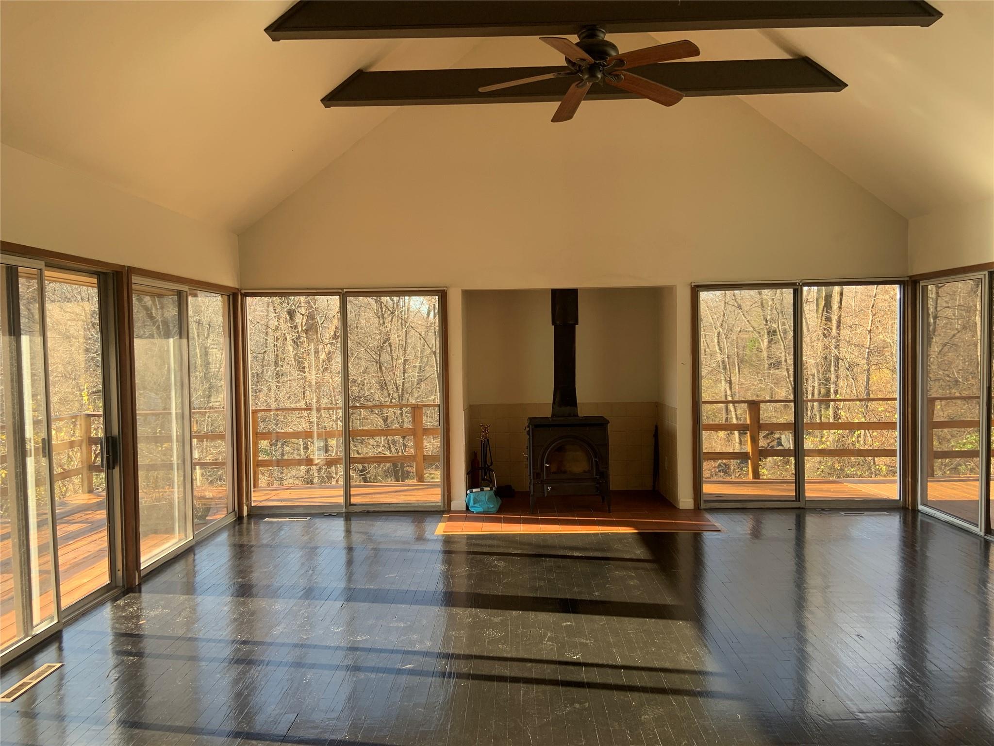 a view of an entryway with a floor to ceiling window