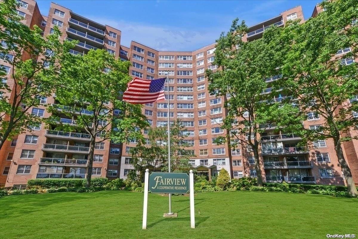 a view of a building with a yard