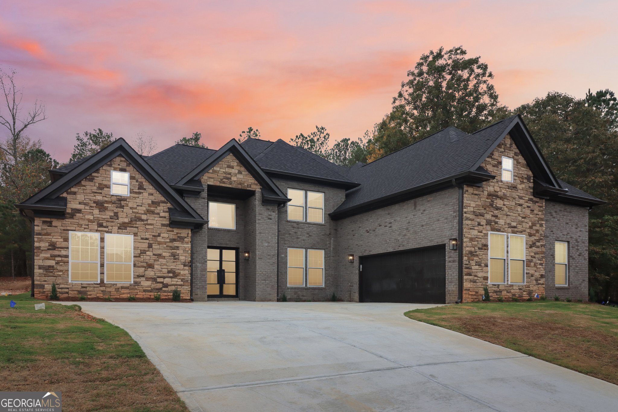 front view of a house with a yard