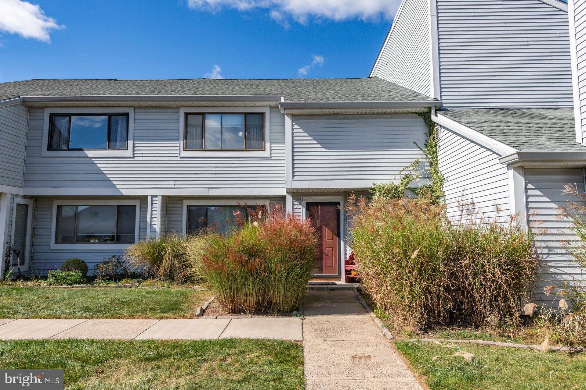 a front view of house with yard