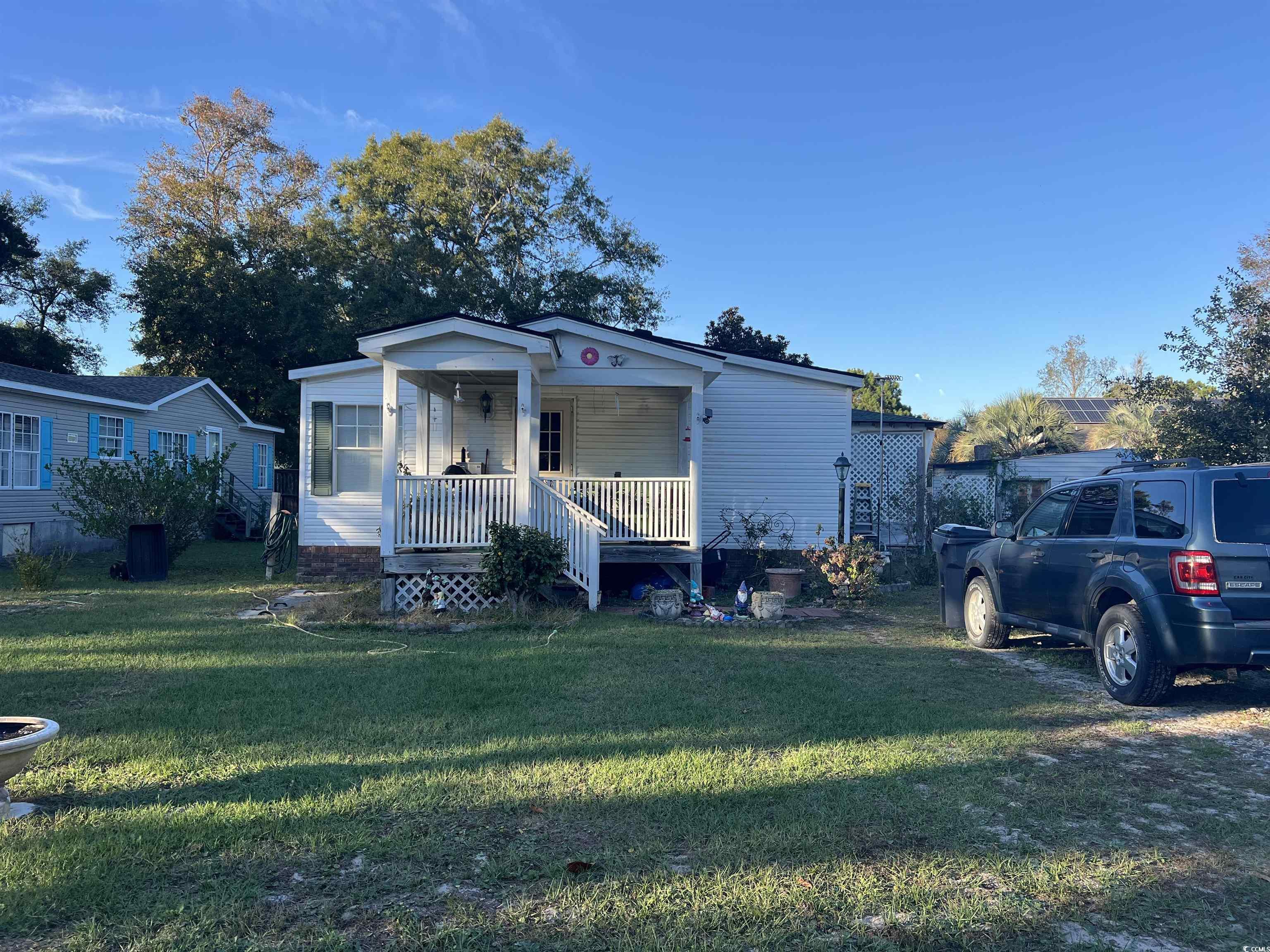 View of front facade featuring a porch and a front