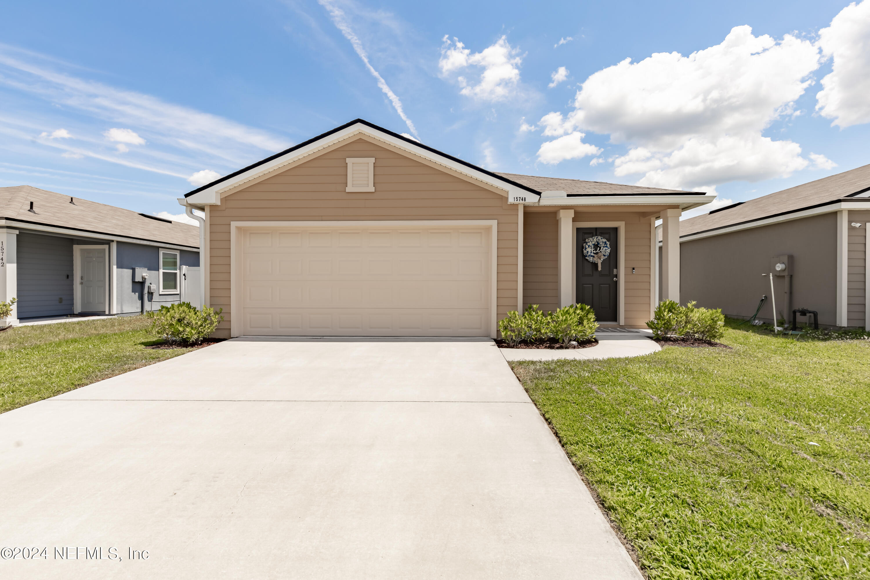 a front view of house with yard