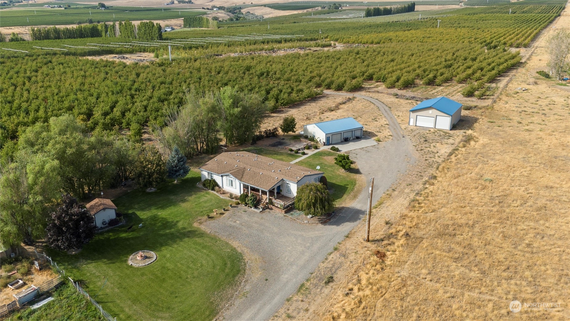 a view of a lake with a yard