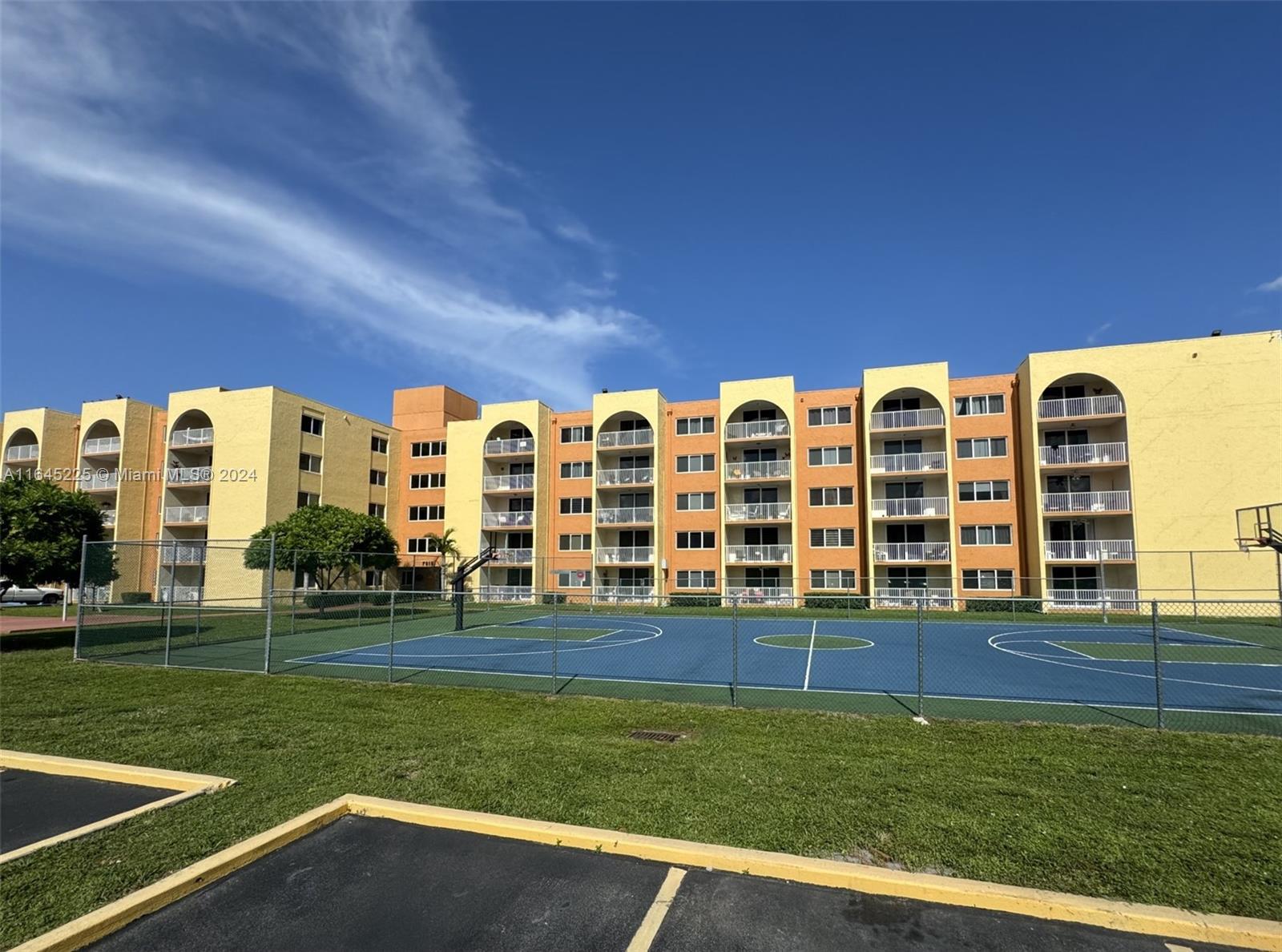 a view of building with yard