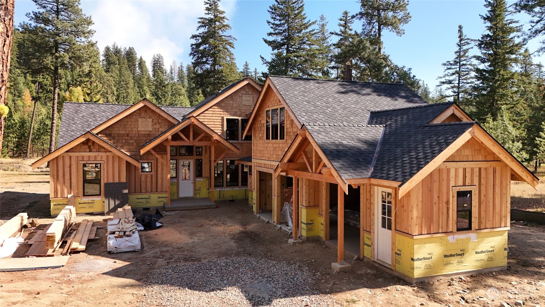 a view of a big house with a yard