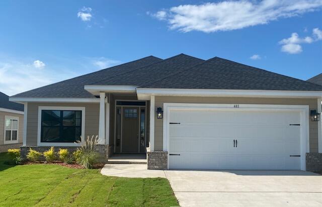 a view of house with yard and entertaining space