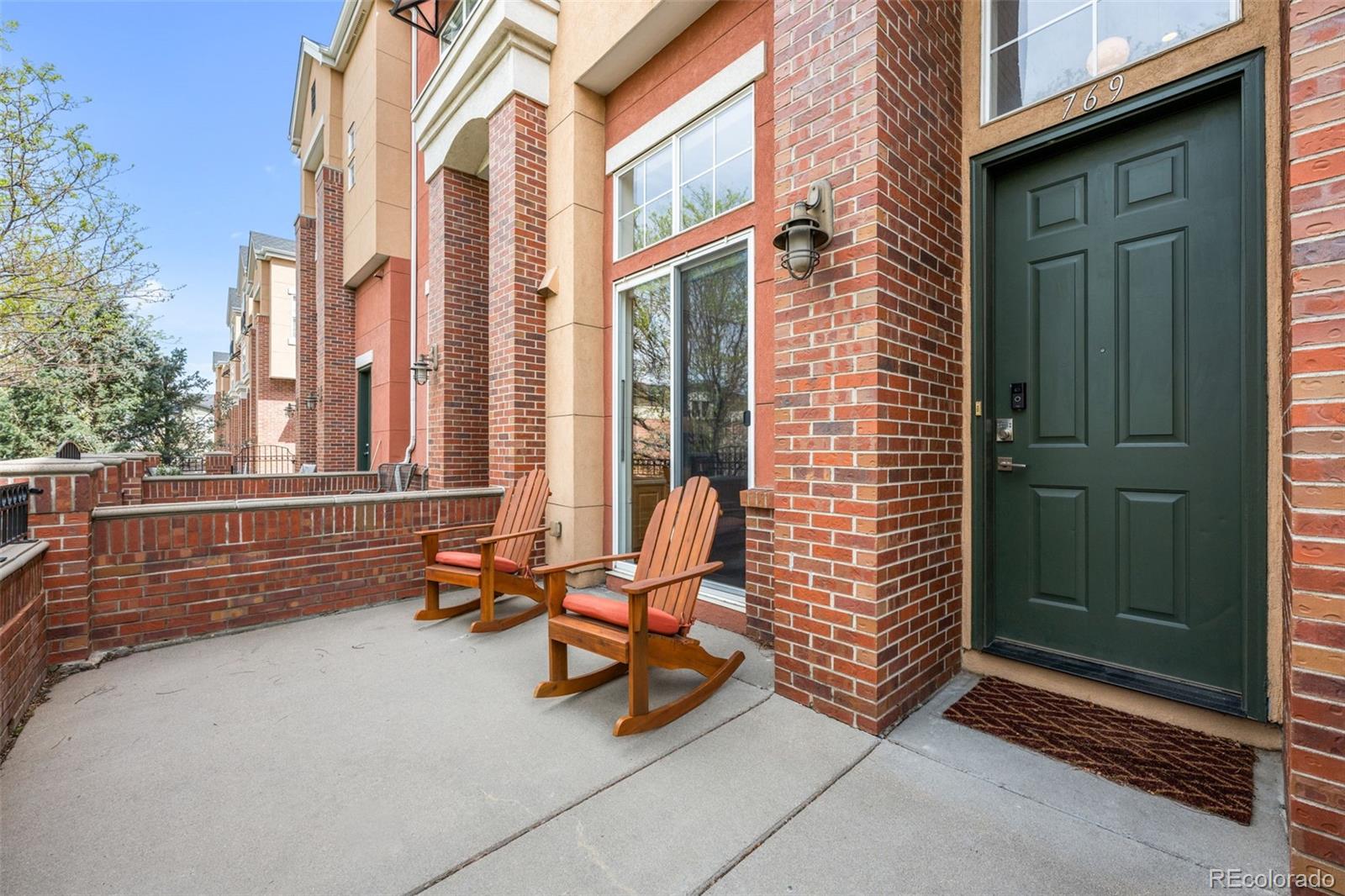 a building outdoor space with patio furniture