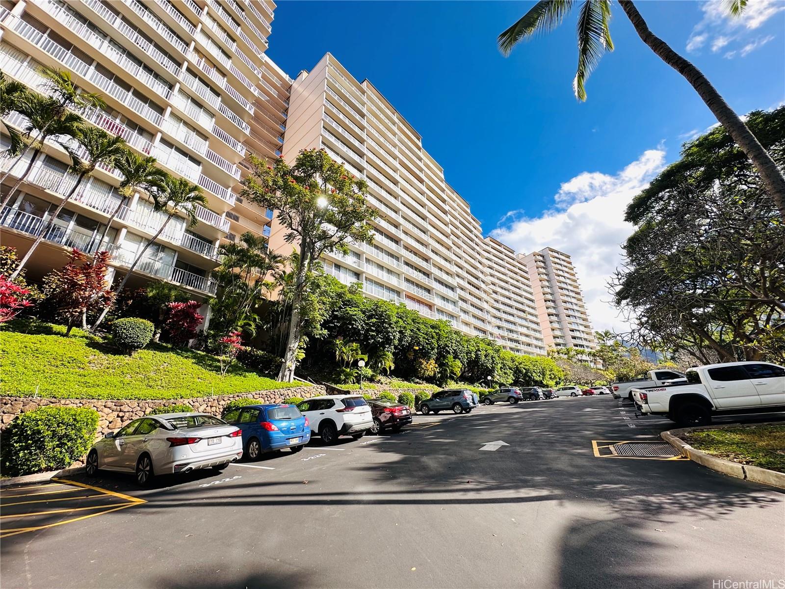 a view of a street with cars