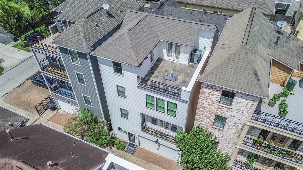 Freestanding townhome  in white with private rooftop deck