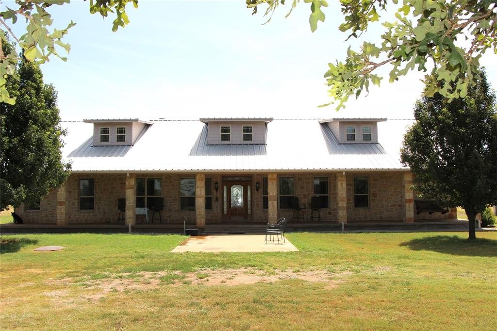 a view of a house with a swimming pool