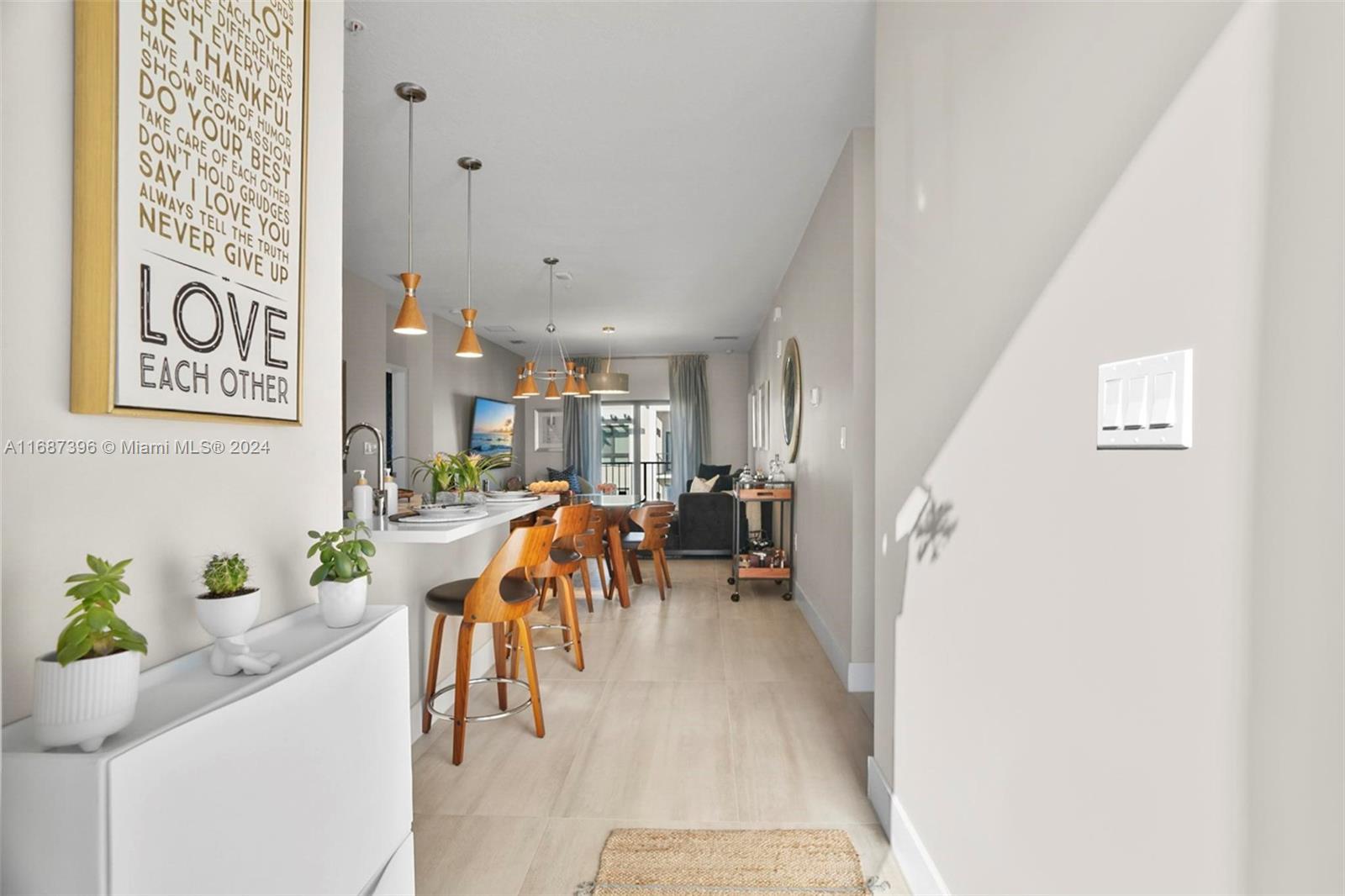 a dining room with furniture and a table