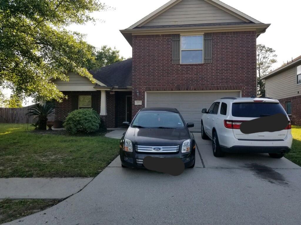 a car parked in front of a house