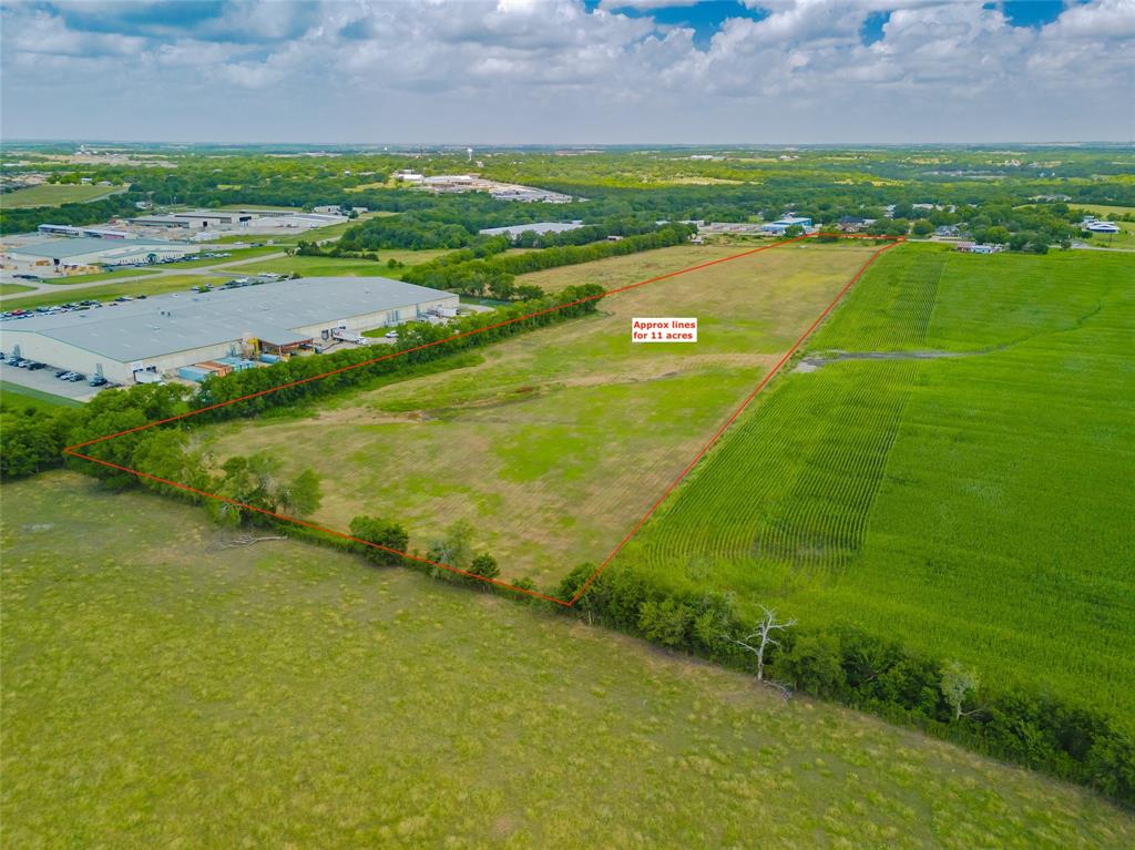 an aerial view of a houses with outdoor space and river view