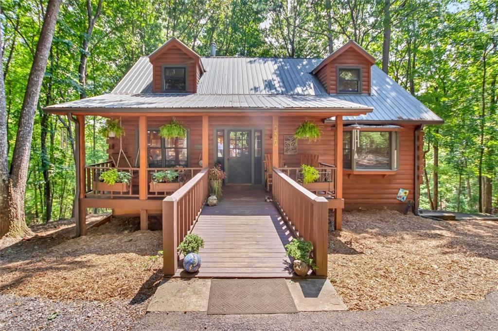 a front view of a house with a porch