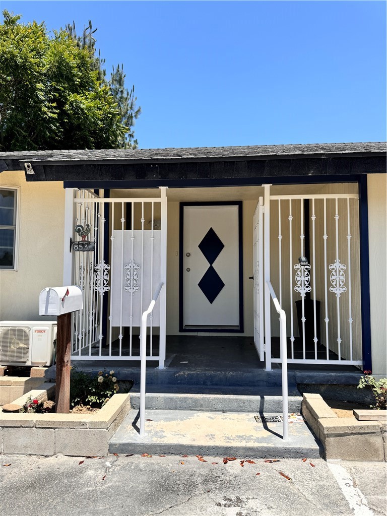 a view of entrance gate of the house