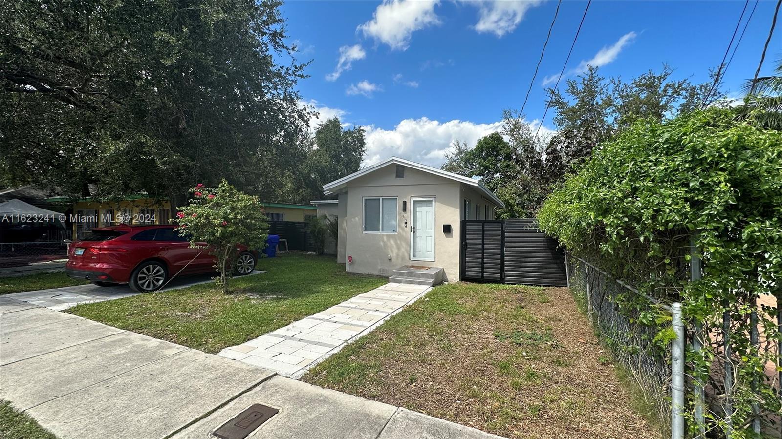 a view of a house with garden