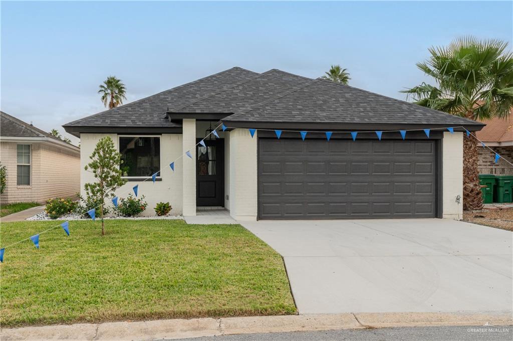 a front view of house with yard