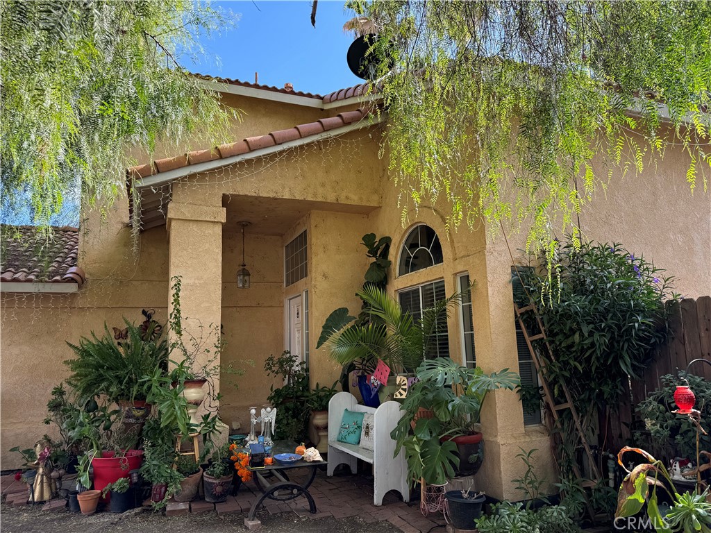 front view of a house with a small yard