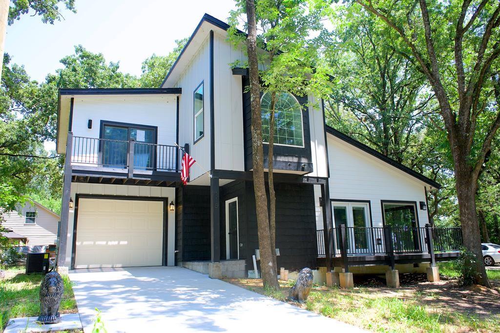 a front view of a house with a porch