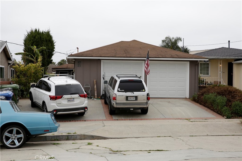 a car parked in front of a house