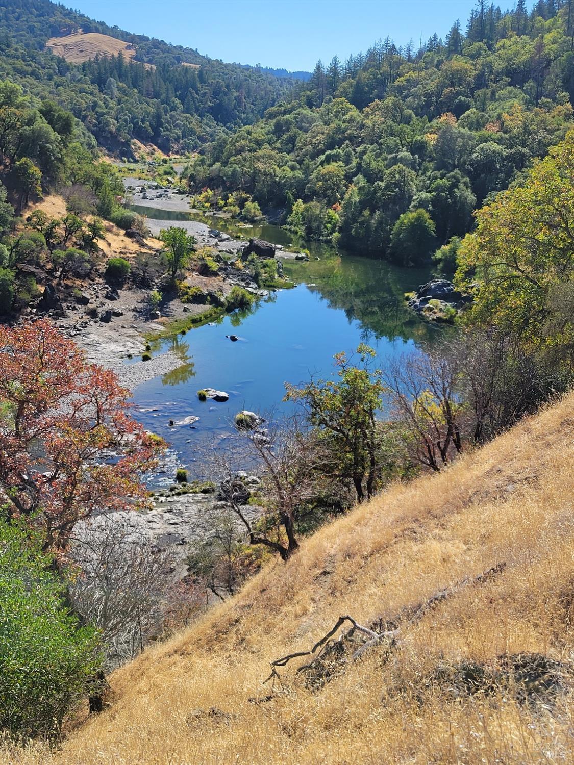 a view of a lake with mountains