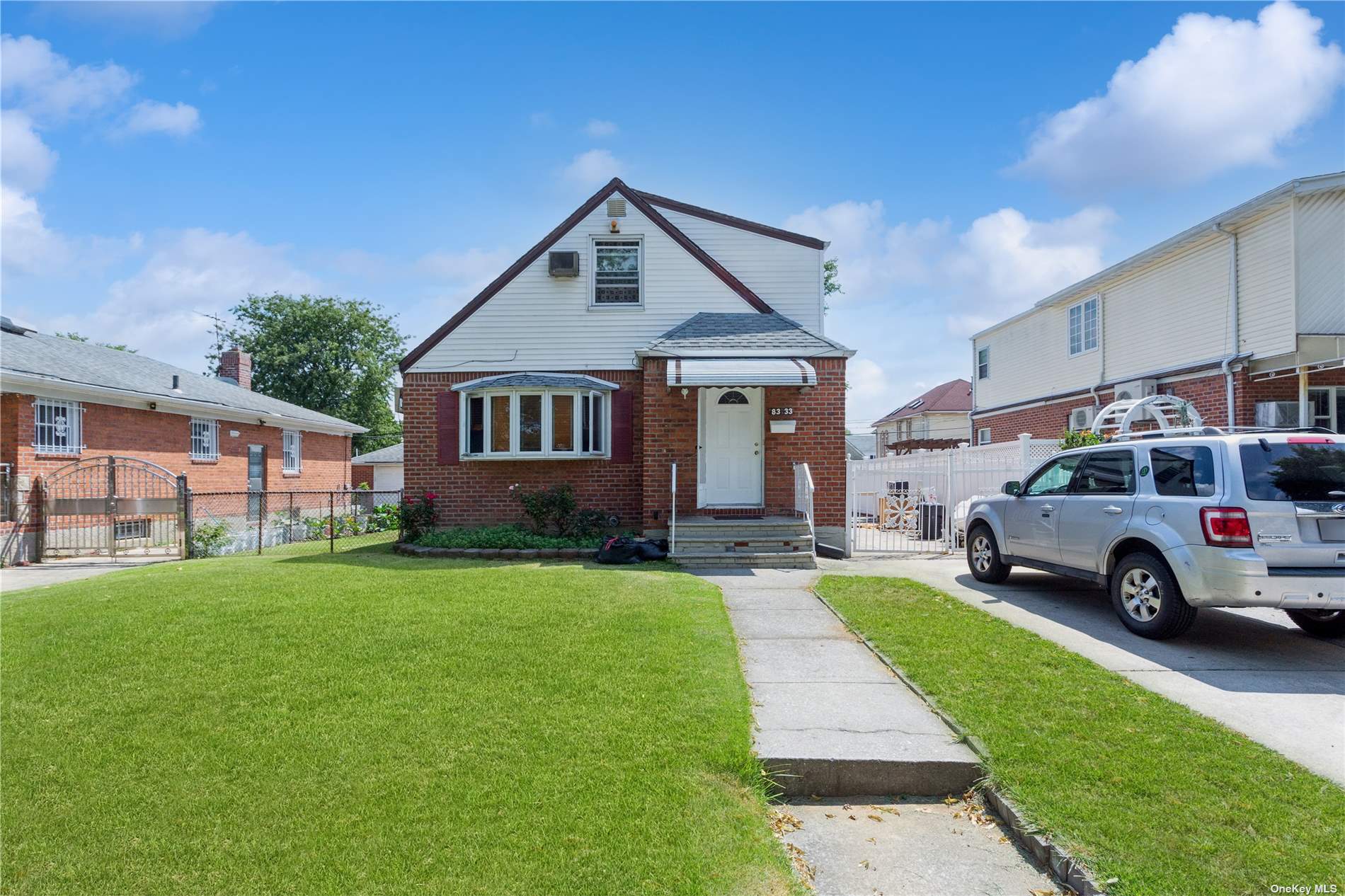 a house view with a garden space